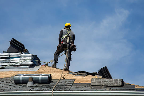 Professional Roof Replacement technician working in Central Islip, NY